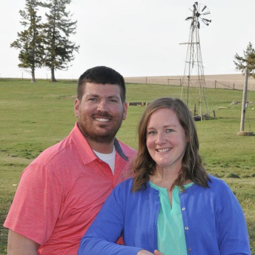 image of the owner & her husband on the family farm in Western Iowa